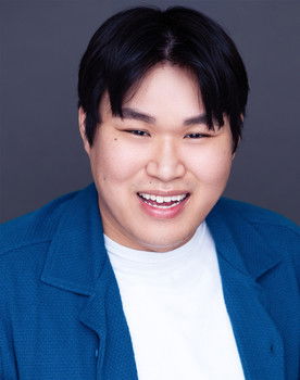 Brandon Doan as August
