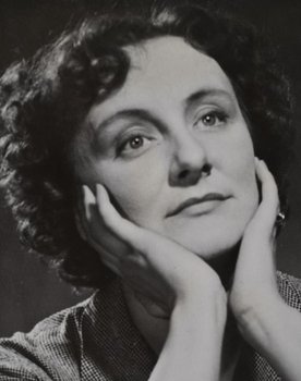 Lulo Purre-Pessegov as Madam Delmas