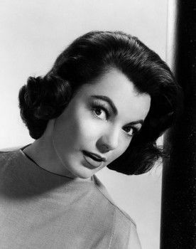 Judy Tyler as Peggy Van Alden
