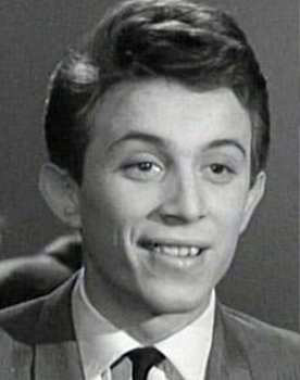 Lucky Blondo as Amarachi, pimp