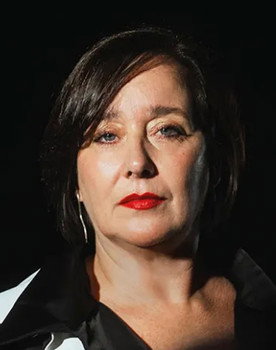 Ana Garibaldi as Mami Común