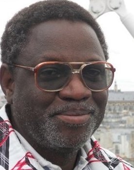 Michel Ange Nzojibwami as Colonel Théoneste Bagosora