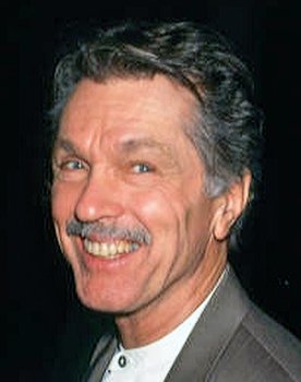 Tom Skerritt as Father Dwelle