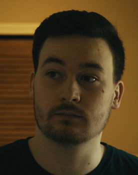 Timothy McCourt as Man in Black