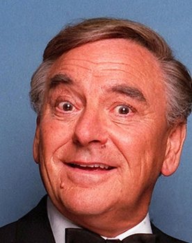Bob Monkhouse as Space Navigator Brad Newman / Swinging Star Compere (voice)