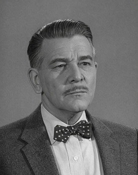 Warren Parker as Warden