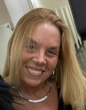 Lynn Marocola as NYPD Officer