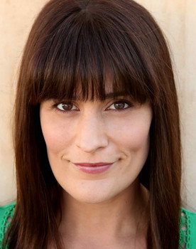 Dorien Davies as Brunette Victim in Bed