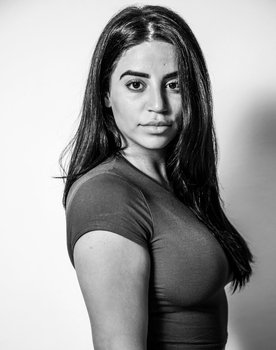 Selma Omari as 