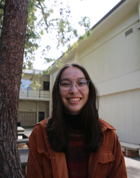 Violet Neils as Charlie