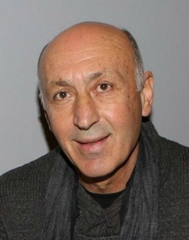 Pavlos Orkopoulos as Romylos Papadamos