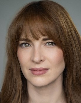 Haley Bishop as Airport Announcer (voice)