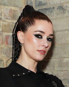 Janet Planet as Janet from Confidence Man