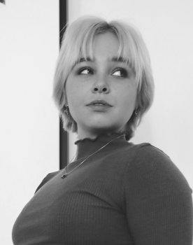 Reese Hildner as Paige