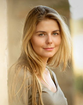 Olivia Mokiejewski as Self (Host)