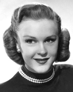 Kay Christopher as Nina Clock Wallet