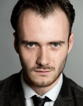 John Black as Major John Nigel Taylor
