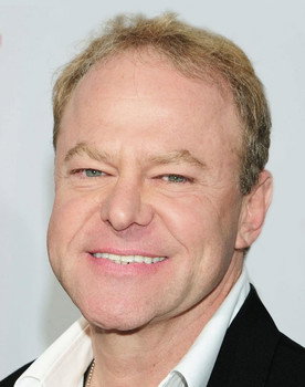 Greg Travis as Father Cooper
