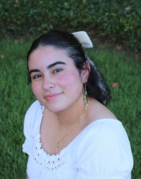 Genesis Gabriel as May