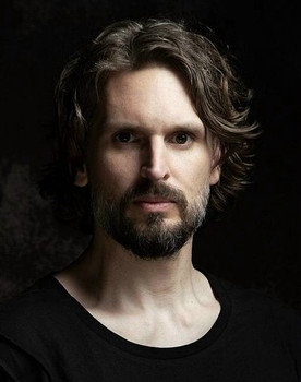 Stefan Helleblad as Rhythm Guitar / Backing Vocals