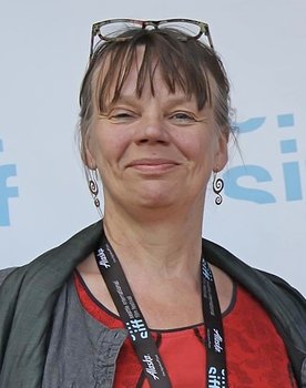 Kirsi Mattila as Director