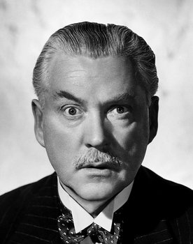 Nigel Bruce as Governor Sir Charles Coutts