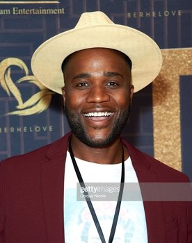 Abraham Amkpa as Louis Jr.