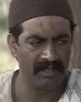 Mohamed Abdel Razek as The Janitor