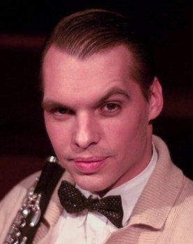 Jan Strýček as David Škach