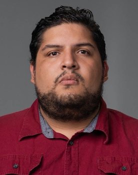 Alvaro J. Escalante as Judge (voice)