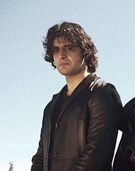 Noah Robbie as Rogan