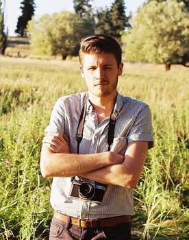 Garrett Elmer as Boy on Bike