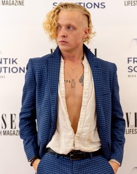 Rae Serbeck as Cocktail Party Goer