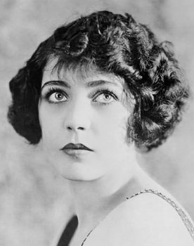 Renée Adorée as Madge