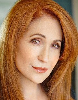 Elizabeth Arlen as Elaine Wells