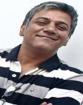 Michael Muthu as Police Officer