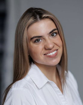 Zara Martin as The Wife