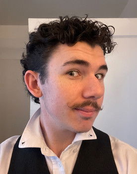 Conner Jackson as Cowardly Lion