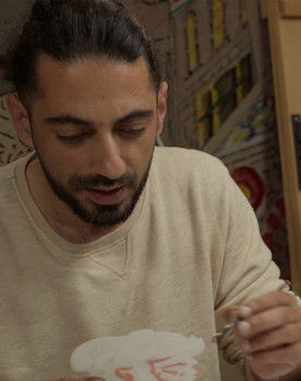 Mpampis Makris as Shadow Puppeteer