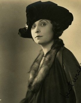 Maude George as Madame Bauer