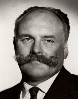 Jimmy Edwards as Farmer Briggs