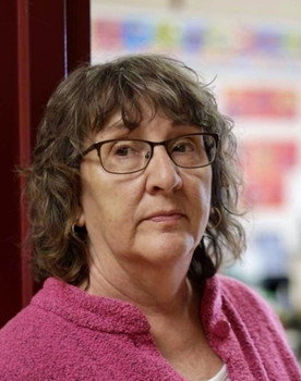 Sara Amrhein as Mrs. Collins