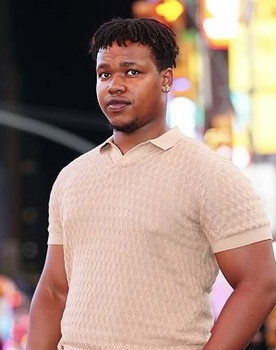 Brandon Ndagiji as Football Player #3