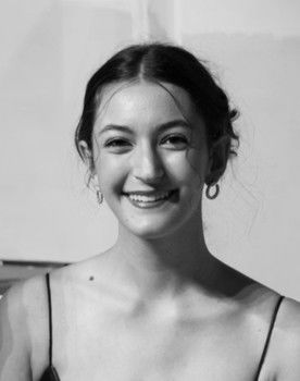 Sarah Levy as Girl in Elevator/Mom