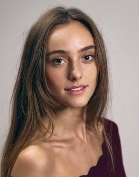 Julie Hadida as 