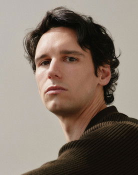 Cory Michael Smith as Adrian