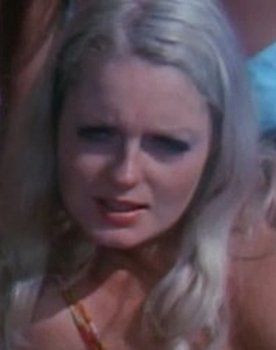 Penny Boran as Orange Bikini Girl (uncredited)