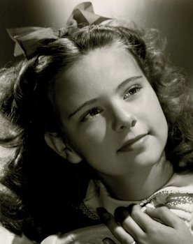 Joan Carroll as Joan Keen