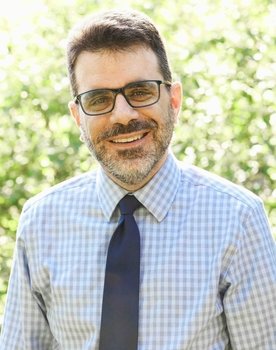Mark Kaiserman as Rabbi