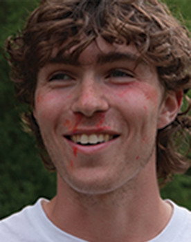 TJ Strubbe as Greg Mills